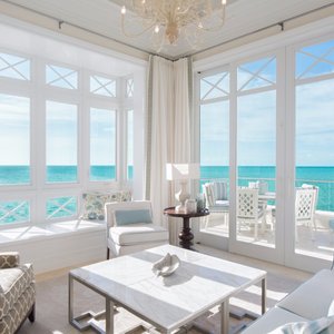 Corner ocean front suites offer stunning views from living room area 