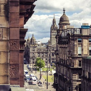 Carlton George Hotel in Glasgow, image may contain: Furniture, Bed, Cushion, Bedroom