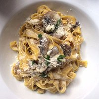 Tagliatelle al Funghi ith Shiitake and Portobello mushrooms, cream and parsley