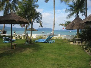 Summer Homes in Palawan Island, image may contain: Resort, Hotel, Summer, Chair