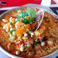 Risotto con vieyras y langostinos