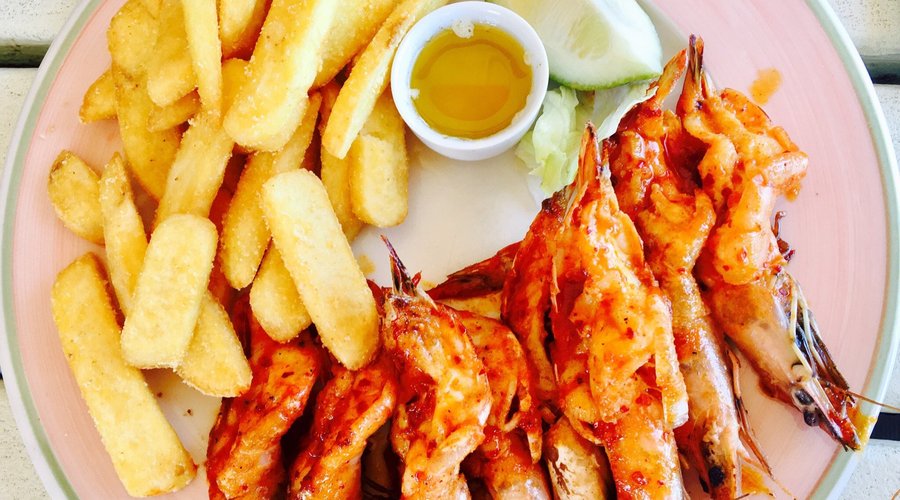Peri Peri prawns and thick cut chips