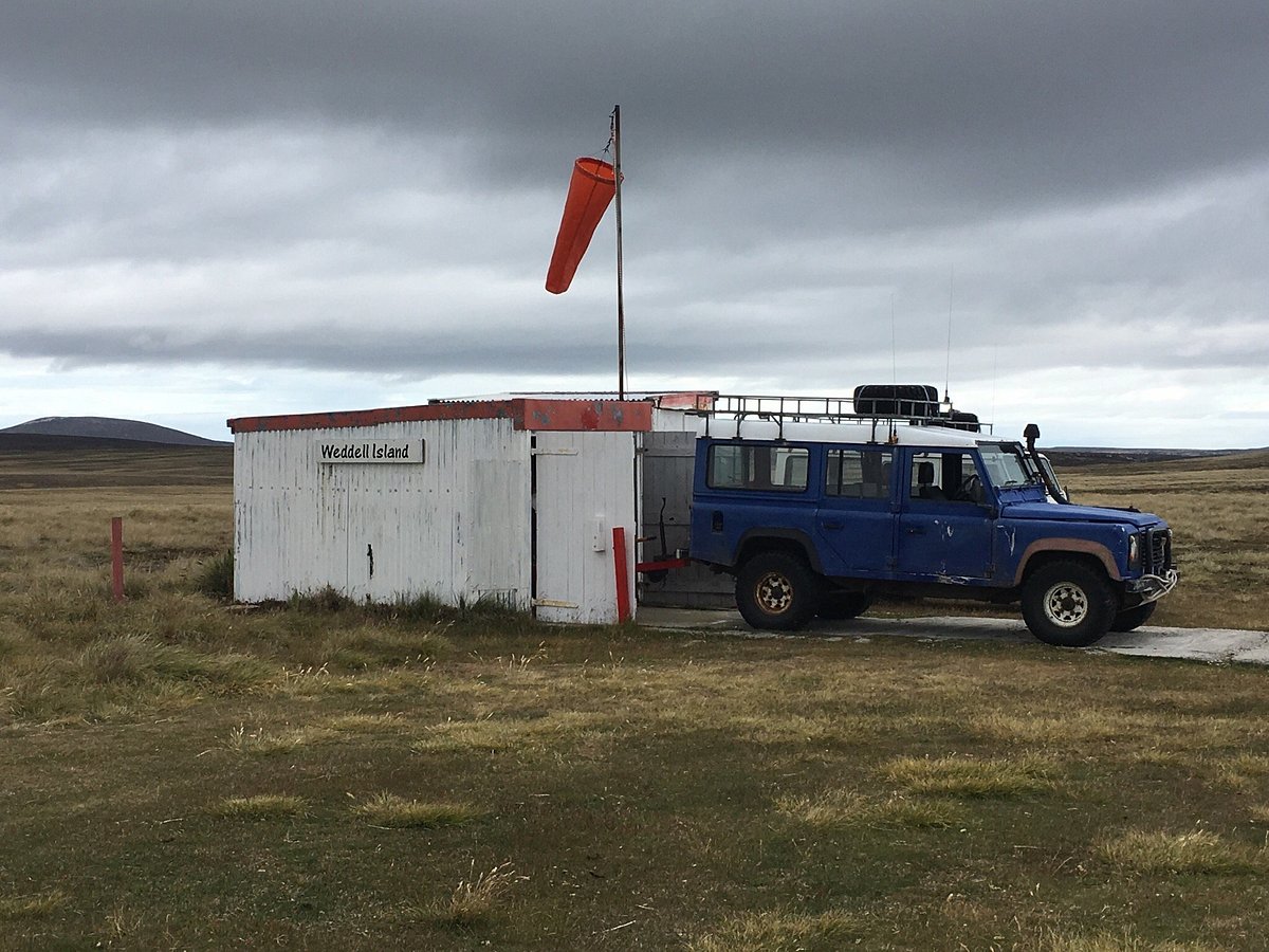 The Land Rover Defender—rugged, charming, but drinks like a fish