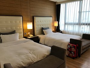 Hotel Modern Puli in Puli, image may contain: Bed, Furniture, Lamp, Interior Design