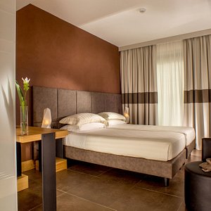 Best Western Plus Hotel Spring House Rome in Rome, image may contain: Hotel, Book, Resort, Furniture