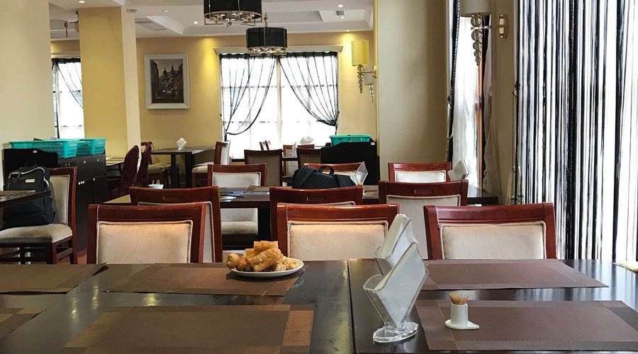 Pictures of room, lobby and dining room