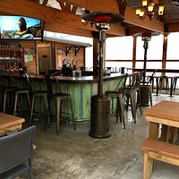 outdoor bar area and tables