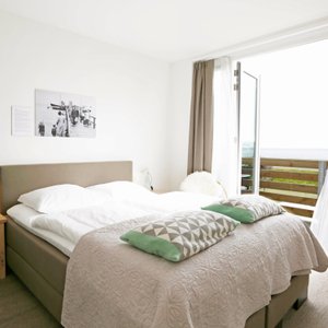 Deluxe tweepersoonskamer met balkon en uitzicht op zee