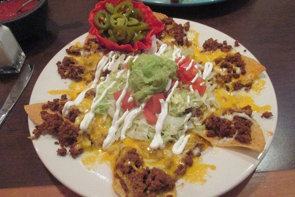 https://dynamic-media-cdn.tripadvisor.com/media/photo-o/0e/38/c3/97/lunch-nacho-plate.jpg?w=600&h=400&s=1