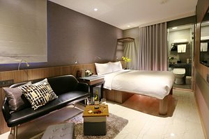 Beauty Hotels Taipei - Hotel B7 Journey in Zhongzheng District, image may contain: Home Decor, Furniture, Living Room, Couch