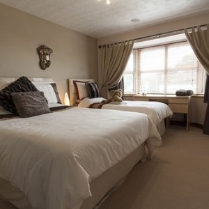 Family Room with En Suite large room with king size bed, single bed fridge complementary condime