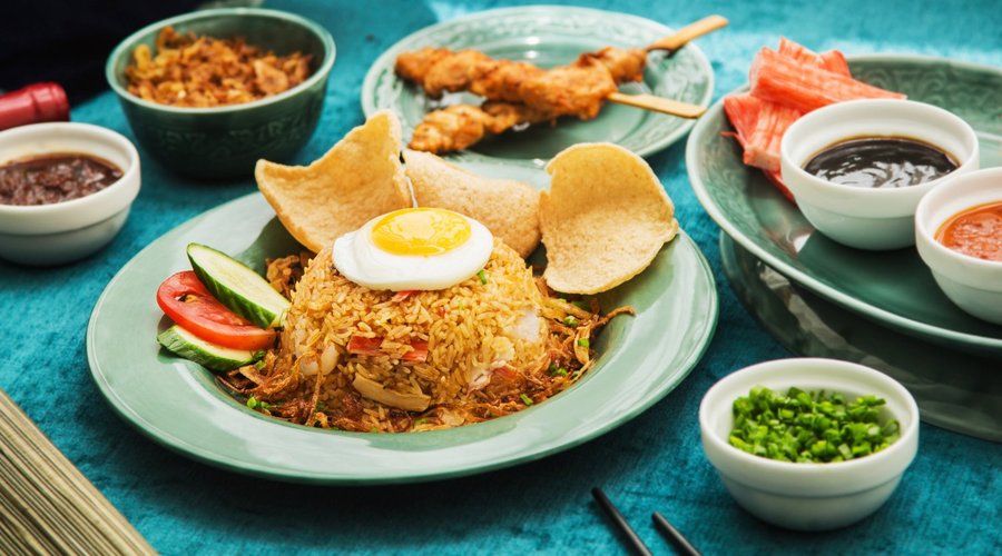 Nasi Goreng (Spicy Indonesian Fried Rice Served With Chicken Satay & Fried Egg)