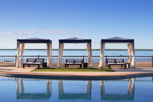 La Posada Hotel & Beach Club in La Paz, image may contain: Outdoors, Waterfront, Water, Bench