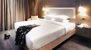 Saz City Life Hotel in Ioannina, image may contain: Furniture, Bed, Interior Design, Lamp