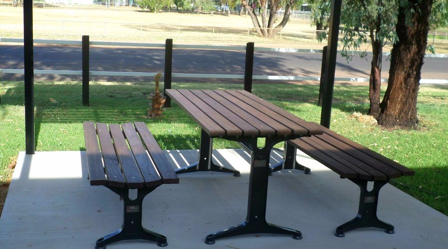 Table and Chairs at 1 of 2 Pergolas