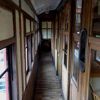 Down the corridor of the railway carriage
