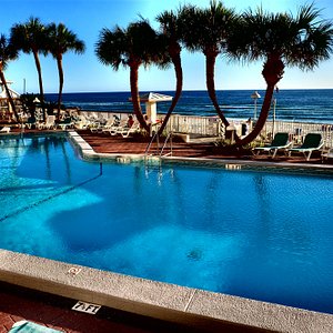 Palmetto Inn & Suites in Panama City Beach, image may contain: Hotel, Resort, Pool, Summer