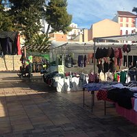 A small typical market with plenty of fresh produce.