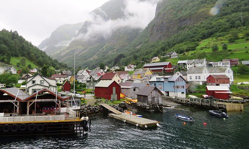 Misty village at Naeroyfjord