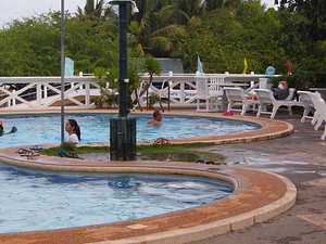 Punta Riviera Resort in Luzon, image may contain: Pool, Water, Person, Chair