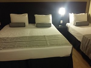 Grande Hotel Petrópolis in Petropolis, image may contain: Bed, Furniture, Cushion, Bedroom