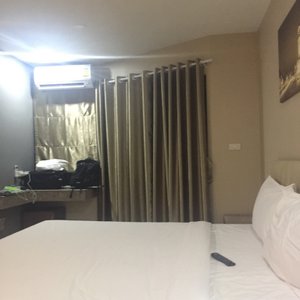 The Coconut Hotel in Lampang, image may contain: Bed, Furniture