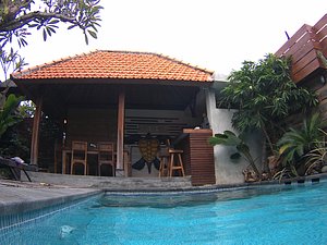 Rai House Sanur in Sanur, image may contain: Villa, Pool, Water, Chair