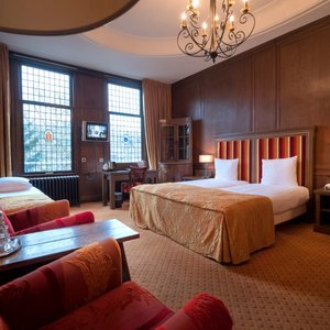 Hotel Aalders in Amsterdam, image may contain: Bed, Furniture, Indoors, Chair