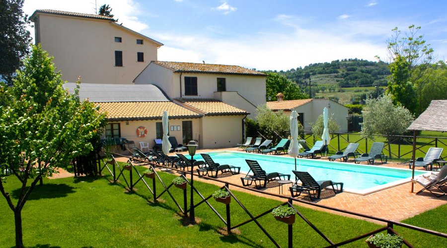 View of the pool and hotel structure from the garden.