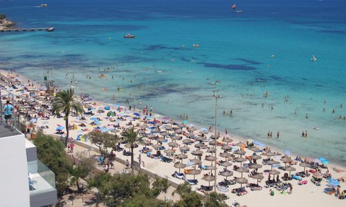 Excellent, clear water and white sand.