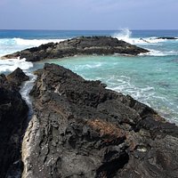 Rocks dividing sections of the beach. Fun to walk on.
