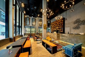 Hotel YAN in Singapore, image may contain: Cafe, Restaurant, Indoors, Cafeteria