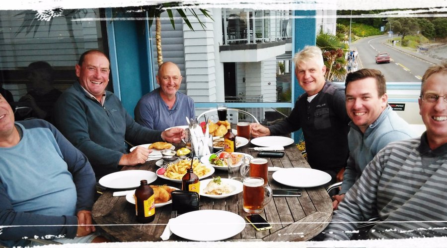 More happy anglers enjoy their days catch.