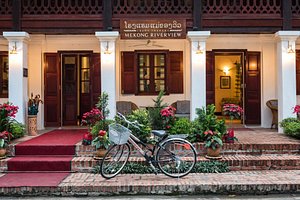 Mekong Riverview Hotel in Luang Prabang, image may contain: Hotel, Resort, Bicycle, Potted Plant