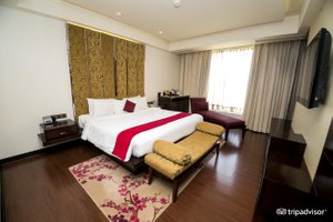 Hotel Royal Orchid in Jaipur, image may contain: Home Decor, Bed, Furniture, Interior Design