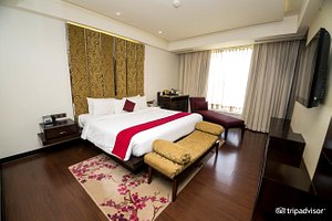 Hotel Royal Orchid in Jaipur, image may contain: Home Decor, Bed, Furniture, Interior Design