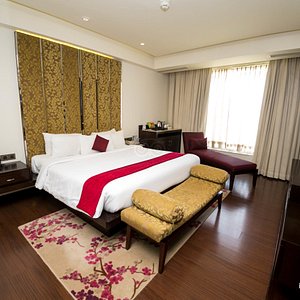 Hotel Royal Orchid in Jaipur, image may contain: Home Decor, Bed, Furniture, Interior Design