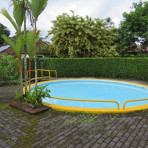 The wading pool, larger swimming pool is beside it.