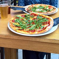 Pizzas were freshly made in front us and tasted great
