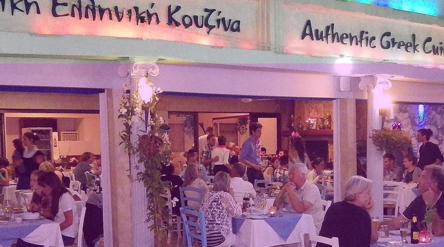Diners at Dias Zeus on a warm summer evening.
