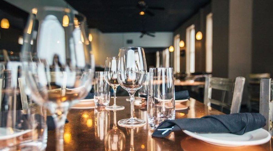 Fine Glassware and copper topped tables