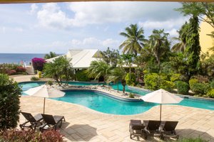 Tropikist Beach Hotel Limited in Tobago, image may contain: Resort, Hotel, Villa, Pool