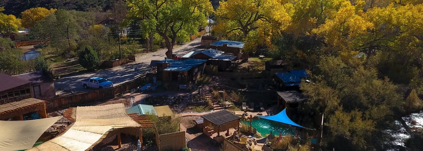 Drone shot of the property and pools