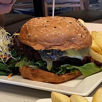 Fish burger with chips & salad.