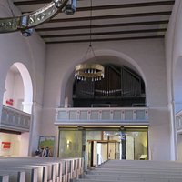 The large metallic chandeliers
