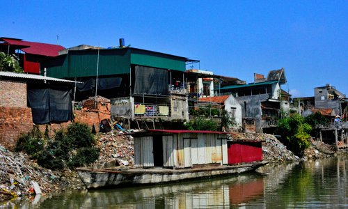Riverside view of Tho Ha Village