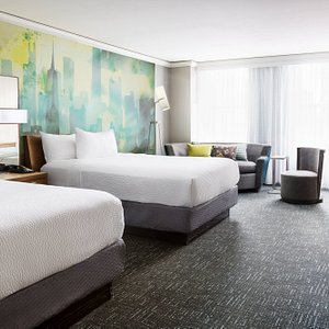 Courtyard by Marriott Chicago Downtown/Magnificent Mile in Chicago, image may contain: Dorm Room, Bed, Couch, Chair