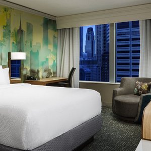 Courtyard by Marriott Chicago Downtown/Magnificent Mile in Chicago, image may contain: Dorm Room, Bed, Couch, Chair
