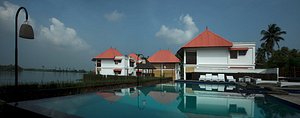 Paloma Backwater Resorts in Alappuzha, image may contain: Resort, Hotel, Building, Villa