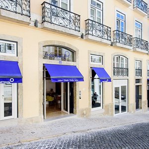 Martinhal Lisbon Chiado Family Suites in Lisbon, image may contain: Home Decor, Couch, Living Room, Table
